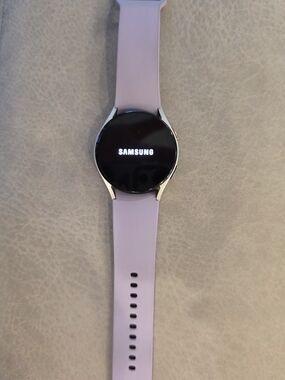 Samsung Smartwatch with Light Purple Silicone Band and Silver Case